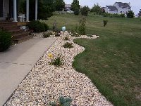 An after.  (after shoveling, by hand, 27,000 lbs of rock.  No not a typo....)