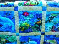 Fish Fabric quilt for my niece.  Quilted, but needs a binding still.