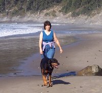 Kellie and Dante walking at Short Sand Beach in Oregon