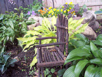 'Pineapple Upside Down Cake' looked delicious, so I gave it a nice spot next to a little twig chair at the front of the garden bed.